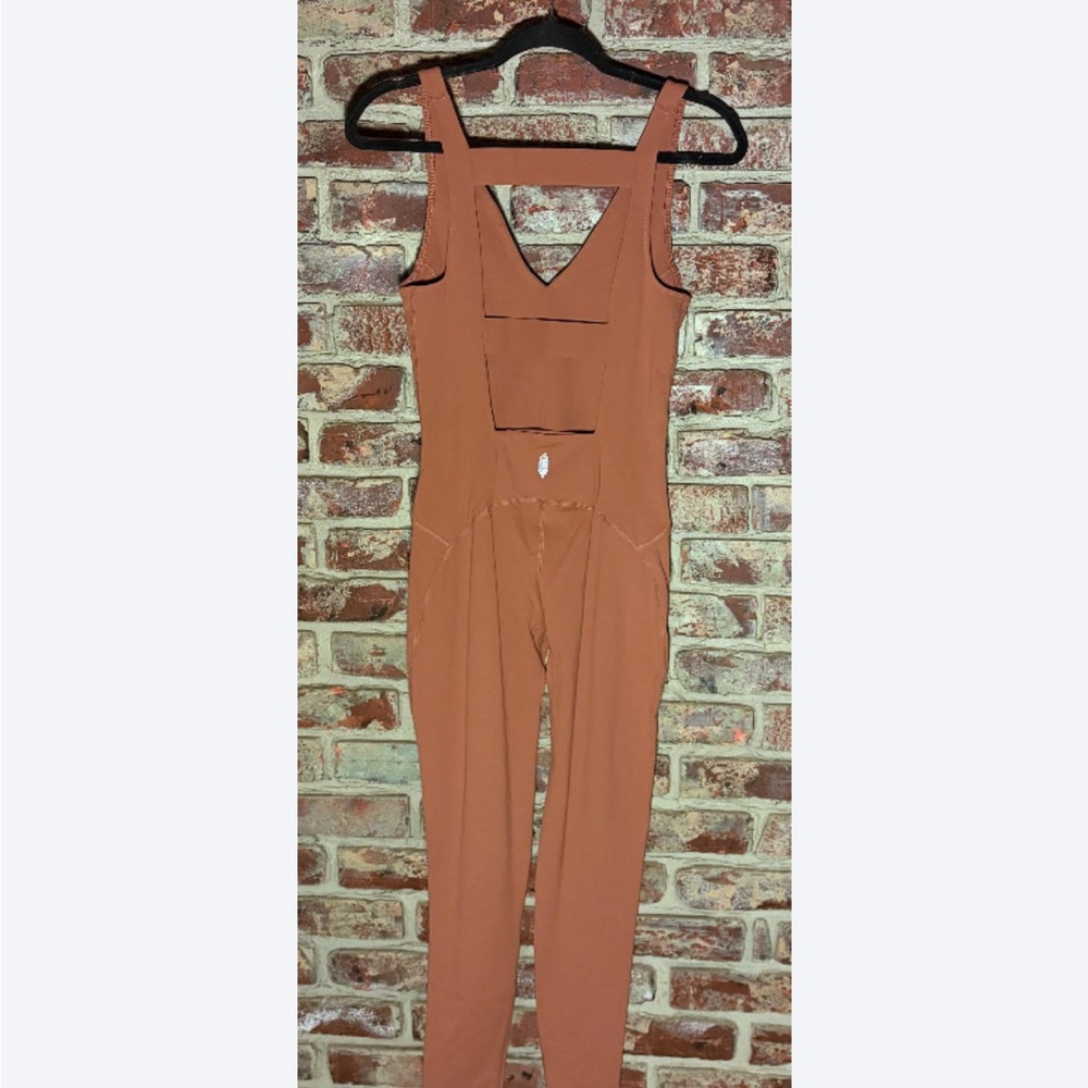 Sold - Similar Items in Closet!
FP Movement Never Better Jumpsuit Rust Size S - Picture 3 of 8